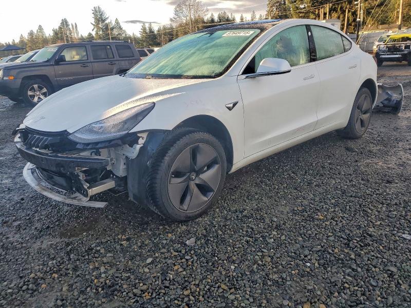 TESLA MODEL 3 2018 with VIN 5YJ3E1EB6JF146775 - Photo from auction