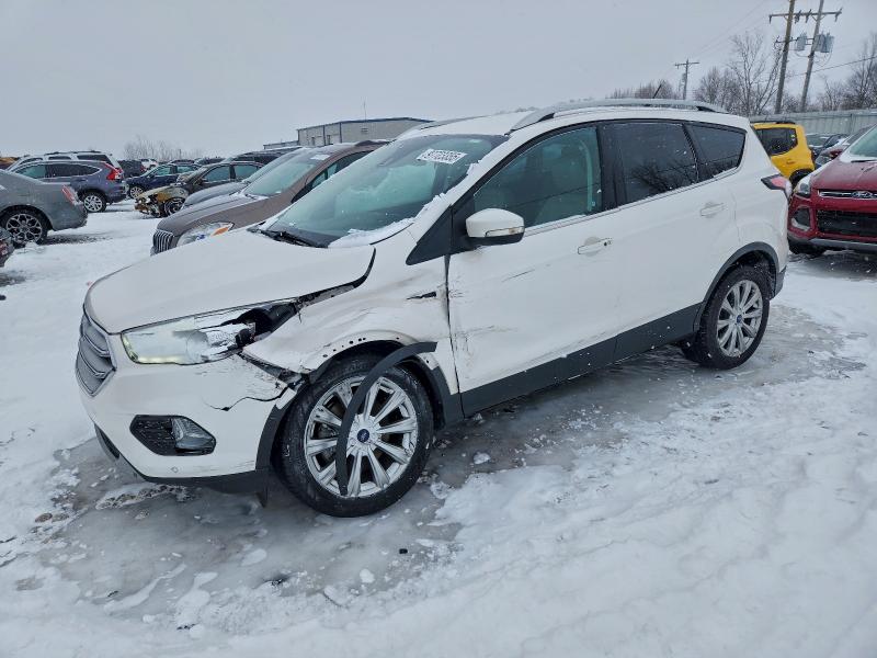 FORD ESCAPE TIT 2018 with VIN 1FMCU9J90JUA70901 - Photo from auction