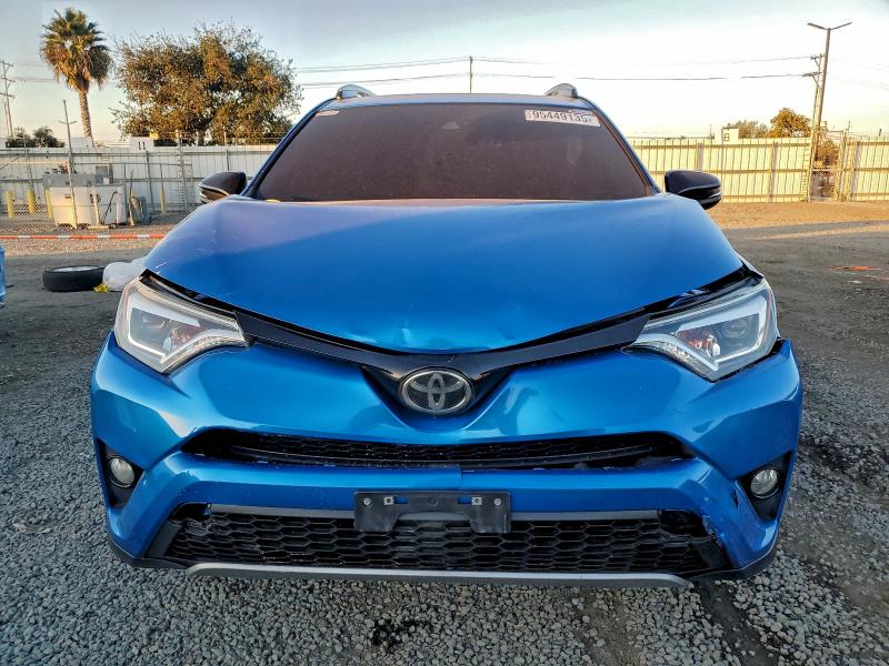 Photo 5 from auction – 2017 TOYOTA RAV4 SE with VIN JTMNFREV8HJ149355