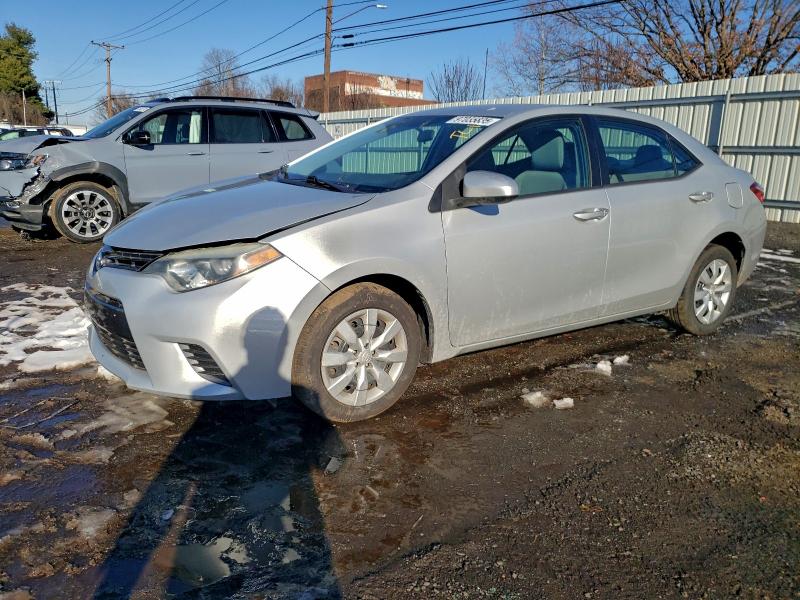 TOYOTA COROLLA L 2015 with VIN 5YFBURHE2FP268371 - Photo from auction