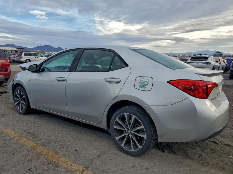 Photo 2 from auction – 2017 TOYOTA COROLLA L with VIN 5YFBURHE6HP715691