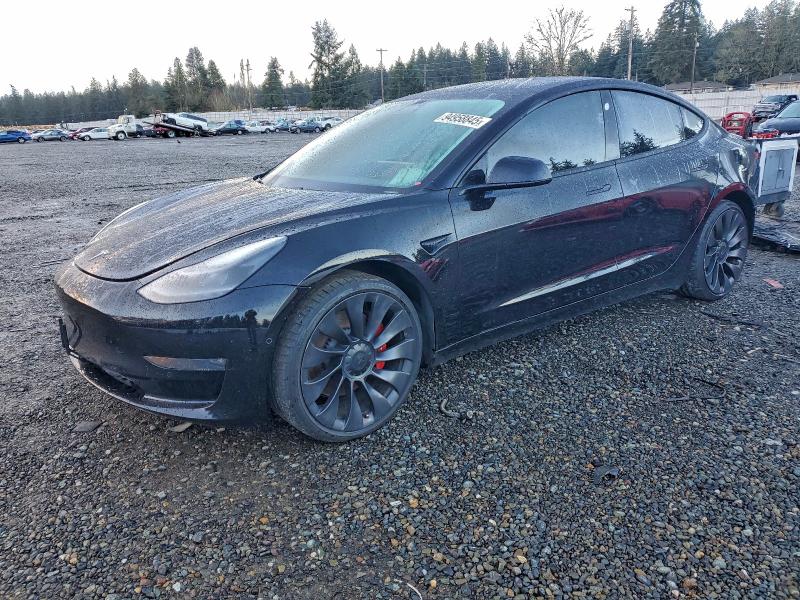 TESLA MODEL 3 2021 with VIN 5YJ3E1ECXMF999323 - Photo from auction
