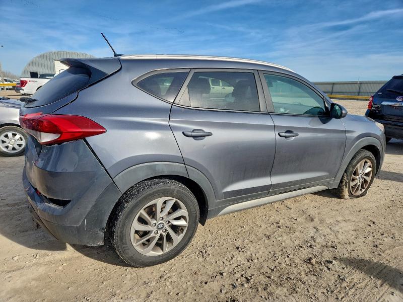 Photo 3 from auction – 2017 HYUNDAI TUCSON LIM with VIN KM8J3CA42HU314120