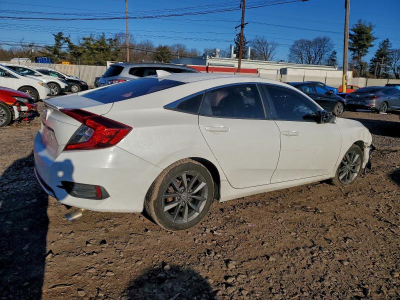 Photo 3 from auction – 2019 HONDA CIVIC EX with VIN 2HGFC1F32KH650991
