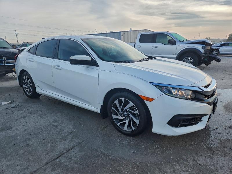Photo 4 from auction – 2018 HONDA CIVIC EX with VIN 19XFC2F77JE038898