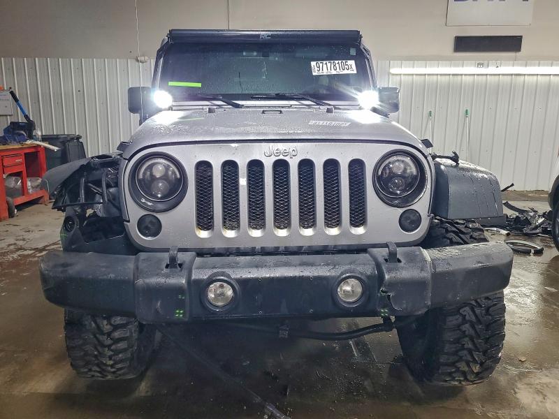 Photo 5 from auction – 2015 JEEP WRANGLER U with VIN 1C4BJWDG0FL766396
