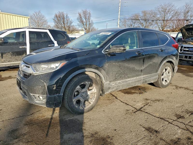 Photo 1 from auction – 2018 HONDA CR-V EX with VIN 5J6RW1H59JA011306