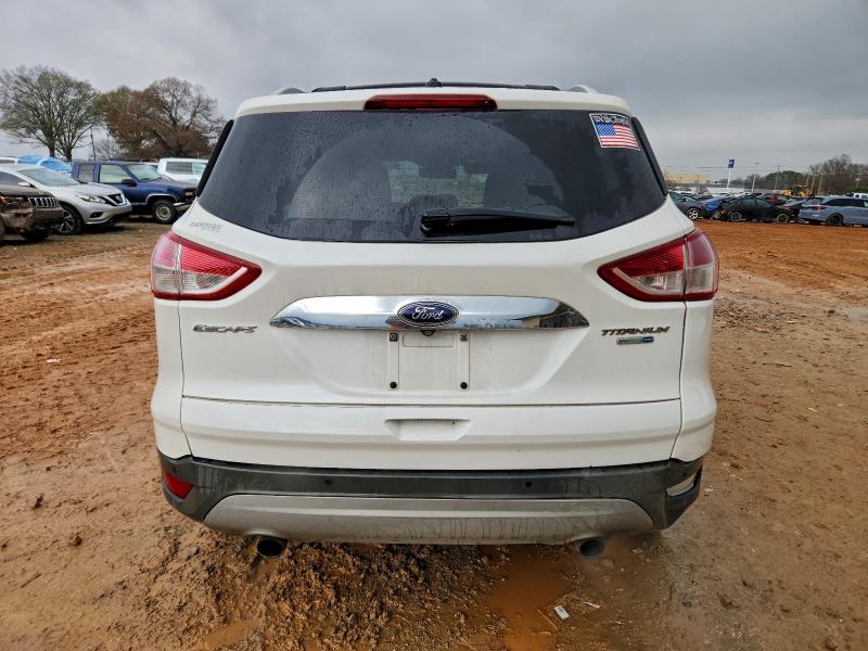 Photo 6 from auction – 2014 FORD ESCAPE TIT with VIN 1FMCU9J97EUE12351