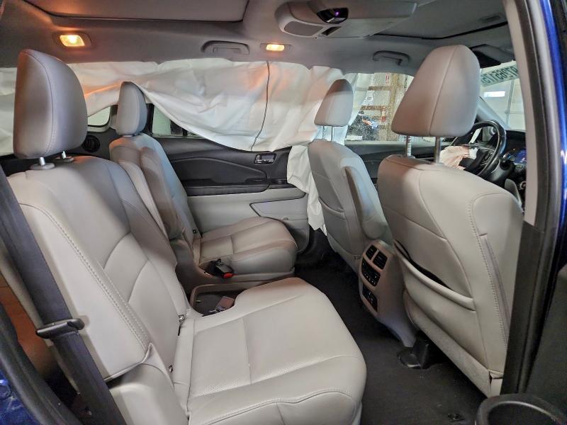 Photo 11 from auction – 2021 HONDA PILOT ELIT with VIN 5FNYF6H08MB003339