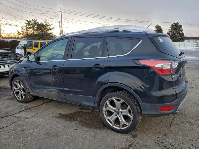 Photo 2 from auction – 2017 FORD ESCAPE TIT with VIN 1FMCU9J96HUB14006