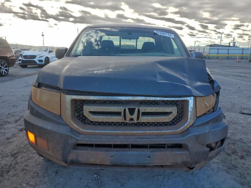 Photo 5 from auction – 2011 HONDA RIDGELINE with VIN 5FPYK1F51BB006696