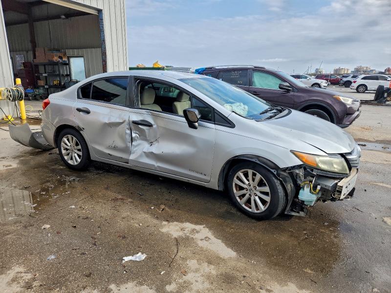 Photo 4 from auction – 2012 HONDA CIVIC DX with VIN 2HGFB2F27CH515698