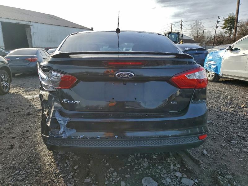 Photo 6 from auction – 2014 FORD FOCUS with VIN 1FADP3F22EL240119