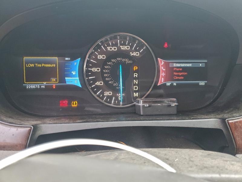 Photo 9 from auction – 2012 FORD EDGE LIMIT with VIN 2FMDK4KC4CBA82873