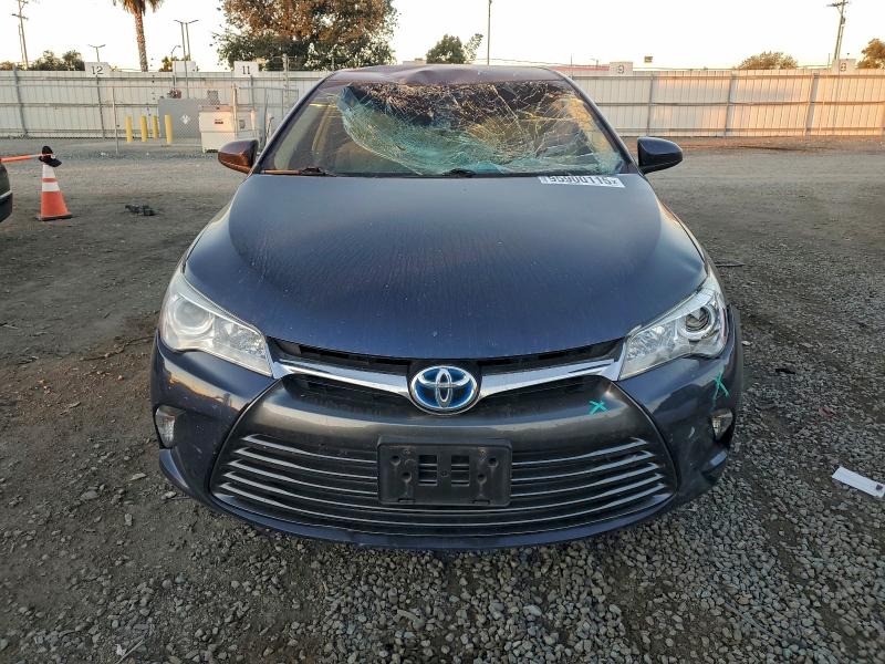Photo 5 from auction – 2016 TOYOTA CAMRY HYBR with VIN 4T1BD1FK8GU184064