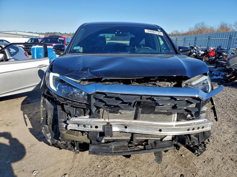 Photo 5 from auction – 2023 HONDA PASSPORT E with VIN 5FNYF8H52PB037885