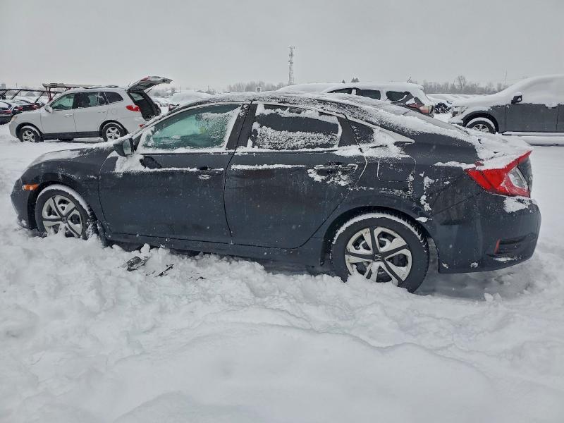 Photo 2 from auction – 2019 HONDA CIVIC EX with VIN 2HGFC2F78KH018506