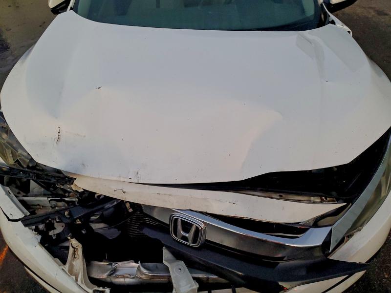 Photo 11 from auction – 2016 HONDA CIVIC LX with VIN 19XFC2F59GE039235