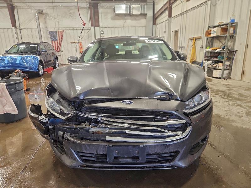 Photo 5 from auction – 2015 FORD FUSION SE with VIN 3FA6P0LUXFR220667