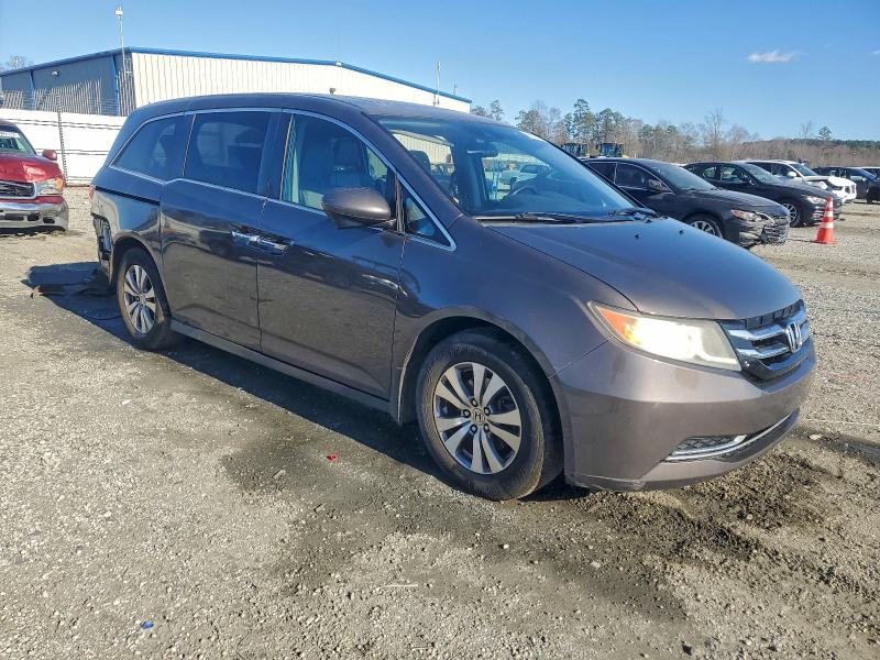 Photo 4 from auction – 2016 HONDA ODYSSEY with VIN 5FNRL5H62GB014076