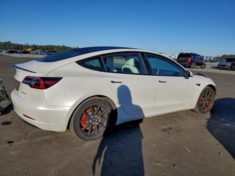Photo 3 from auction – 2021 TESLA MODEL 3 with VIN 5YJ3E1EC5MF991940