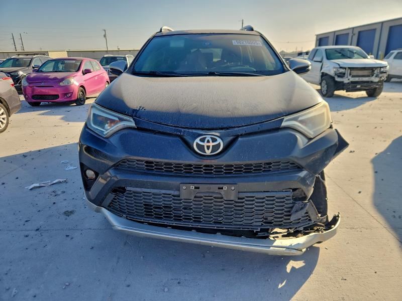 Photo 5 from auction – 2016 TOYOTA RAV4 SE with VIN JTMNFREV5GJ068411