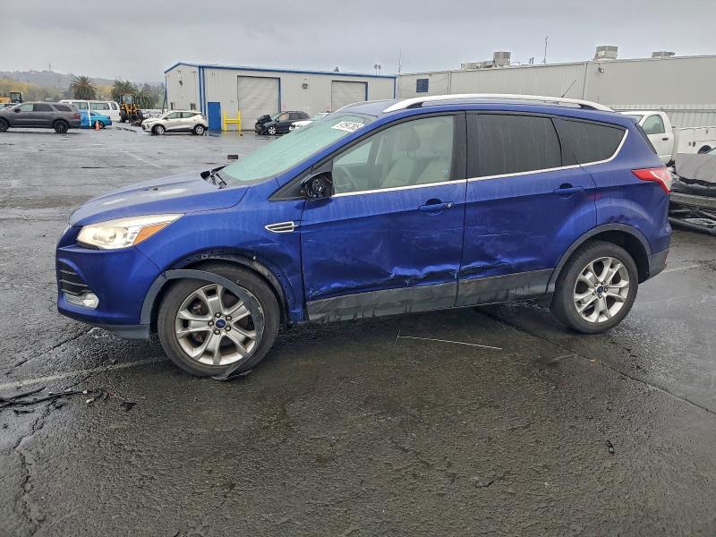 FORD ESCAPE TIT 2015 with VIN 1FMCU0J97FUA27062 - Photo from auction