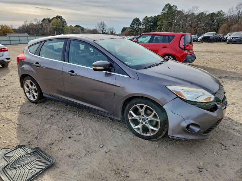 Photo 4 from auction – 2012 FORD FOCUS with VIN 1FAHP3M21CL231560