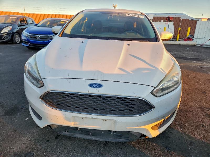 Photo 5 from auction – 2016 FORD FOCUS with VIN 1FADP3F2XGL272237