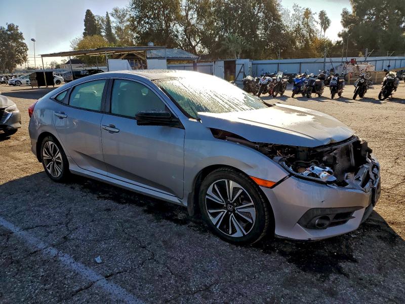 Photo 4 from auction – 2017 HONDA CIVIC EX with VIN 2HGFC1F37HH644337