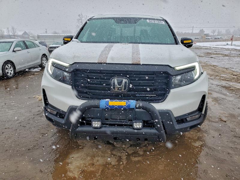 Photo 5 from auction – 2023 HONDA RIDGELINE with VIN 5FPYK3F88PB023976