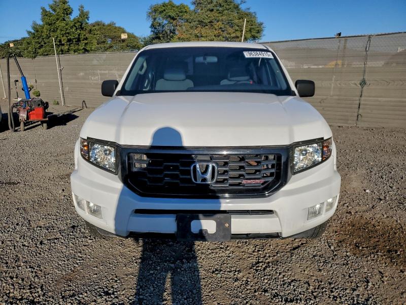 Photo 5 from auction – 2014 HONDA RIDGELINE with VIN 5FPYK1F74EB003300
