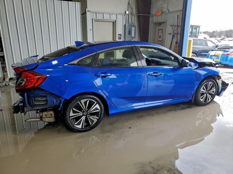Photo 3 from auction – 2018 HONDA CIVIC EX with VIN JHMFC1F35JX039652