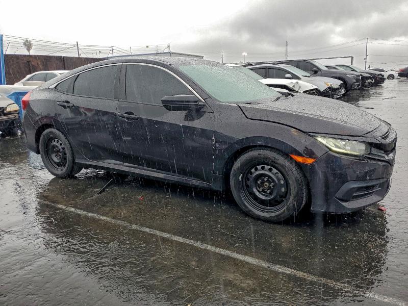Photo 4 from auction – 2016 HONDA CIVIC LX with VIN 2HGFC2F55GH572754