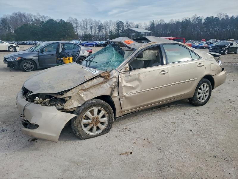 Photo 1 from auction – 2004 TOYOTA CAMRY LE with VIN 4T1BE30K14U809417