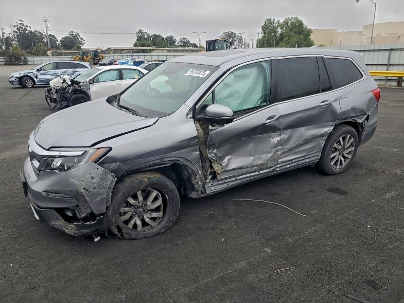 HONDA PILOT EXL 2021 with VIN 5FNYF5H50MB000375 - Photo from auction