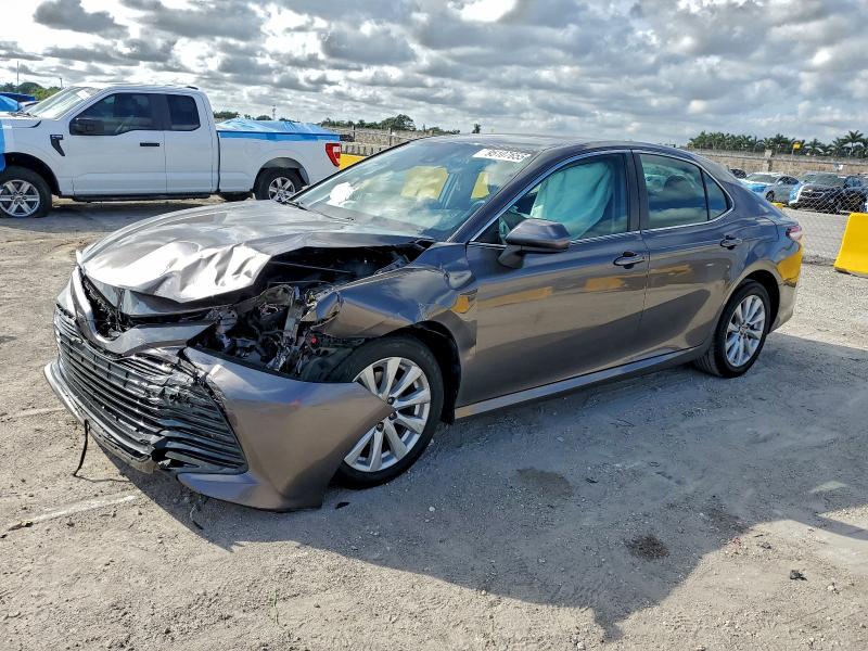 TOYOTA CAMRY LE 2020 with VIN 4T1C11AK2LU948604 - Photo from auction