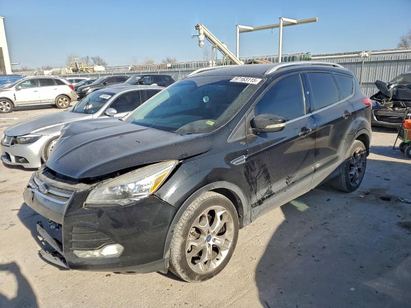 Foto 1 de la subasta – 2014 FORD ESCAPE TIT con VIN 1FMCU0J97EUA35077