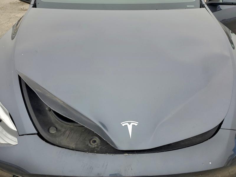 Photo 11 from auction – 2023 TESLA MODEL Y with VIN 7SAYGDEE3PA106559