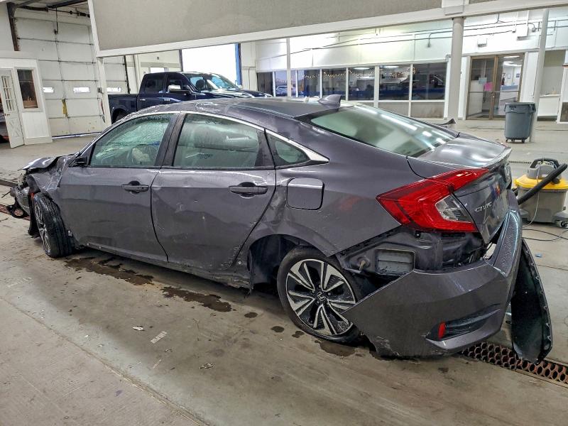 Photo 2 from auction – 2018 HONDA CIVIC with VIN 2HGFC1F76JH640966