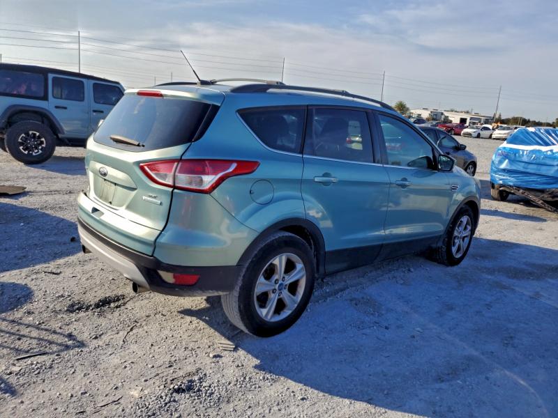 Photo 3 from auction – 2013 FORD ESCAPE with VIN 1FMCU0GX5DUB13053