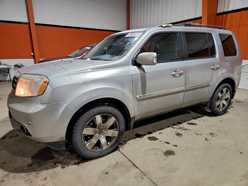 HONDA PILOT TOUR 2013 with VIN 5FNYF4H91DB504432 - Photo from auction