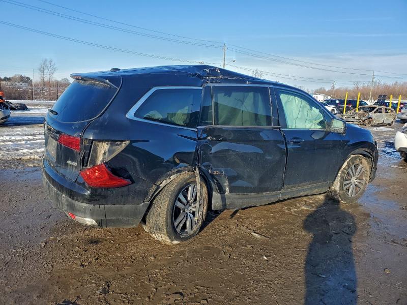 Photo 3 from auction – 2016 HONDA PILOT EXL with VIN 5FNYF6H55GB101082