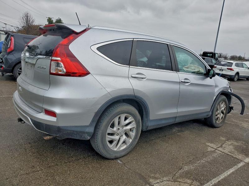 Photo 3 from auction – 2016 HONDA CR-V EXL with VIN 2HKRM4H79GH719359