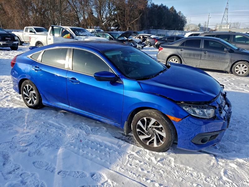Photo 4 from auction – 2018 HONDA CIVIC LX with VIN 2HGFC2F65JH044647