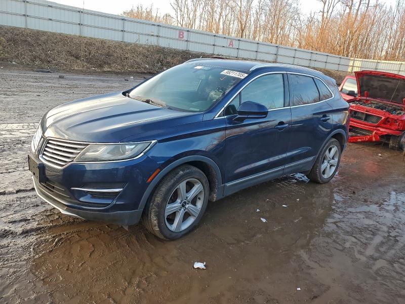 LINCOLN MKC 2015 with VIN 5LMCJ1A98FUJ40675 - Photo from auction