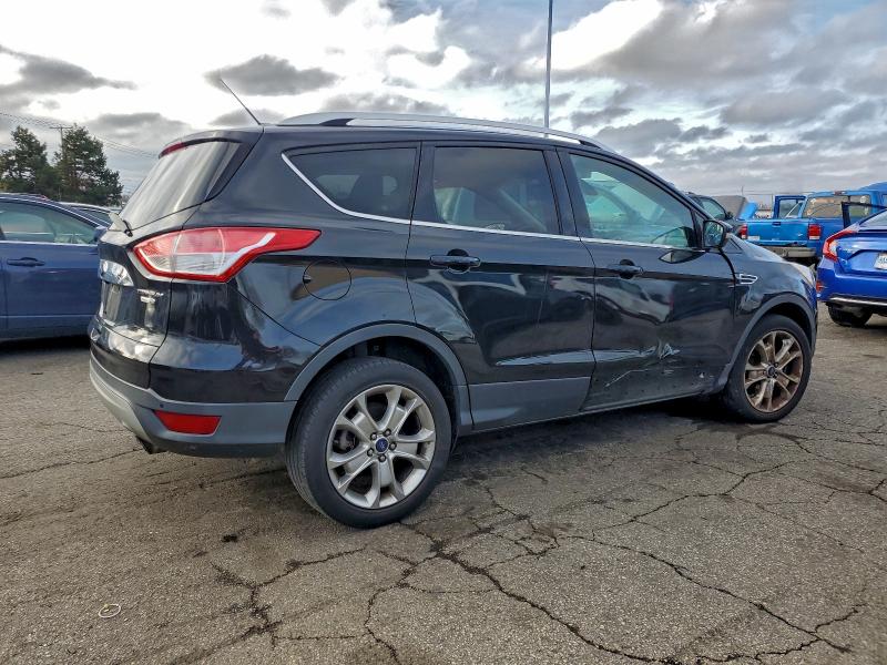 Photo 3 from auction – 2015 FORD ESCAPE TIT with VIN 1FMCU9J98FUB59266