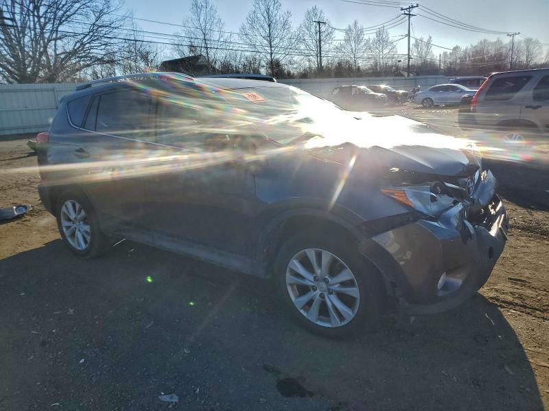 Photo 4 from auction – 2013 TOYOTA RAV4 with VIN 2T3DFREV5DW005799