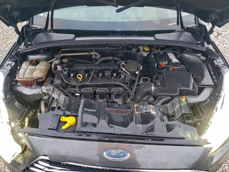 Photo 11 from auction – 2015 FORD FOCUS with VIN 1FADP3J24FL287080