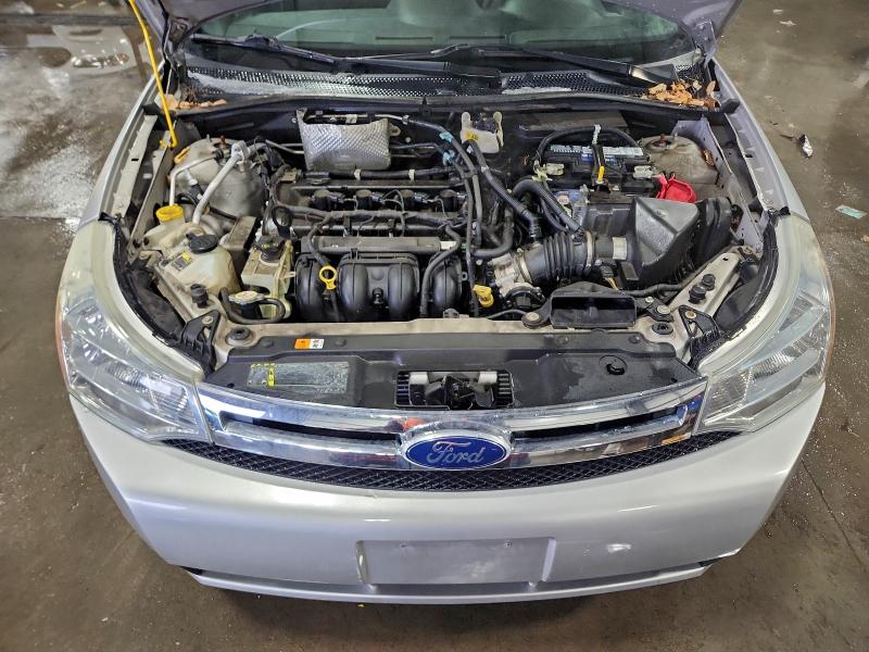Photo 11 from auction – 2011 FORD FOCUS SE with VIN 1FAHP3FNXBW112636